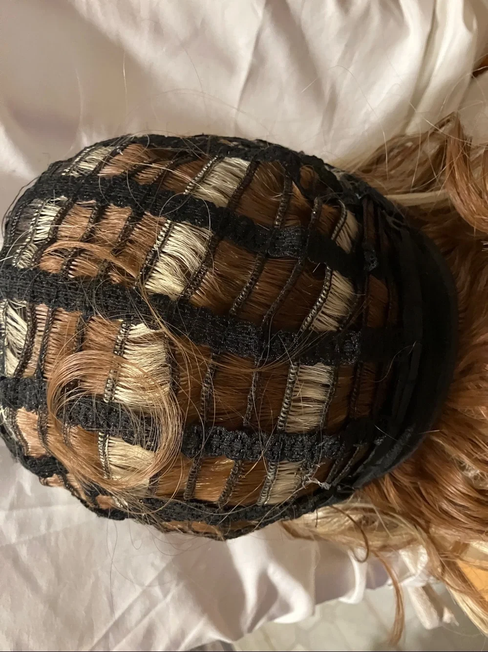 New.  Multi color ( at least 5 different shades ) shaggy n free style wig